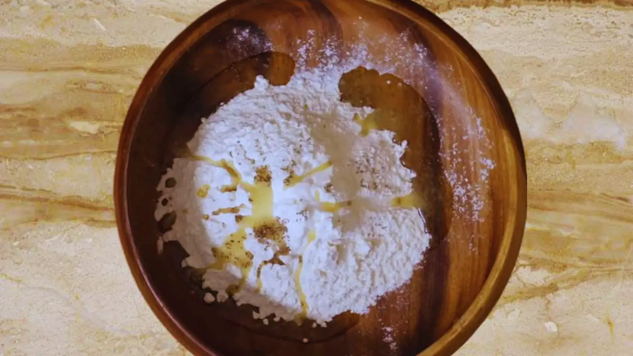 Preparing the dough for making Vegetable Samosa