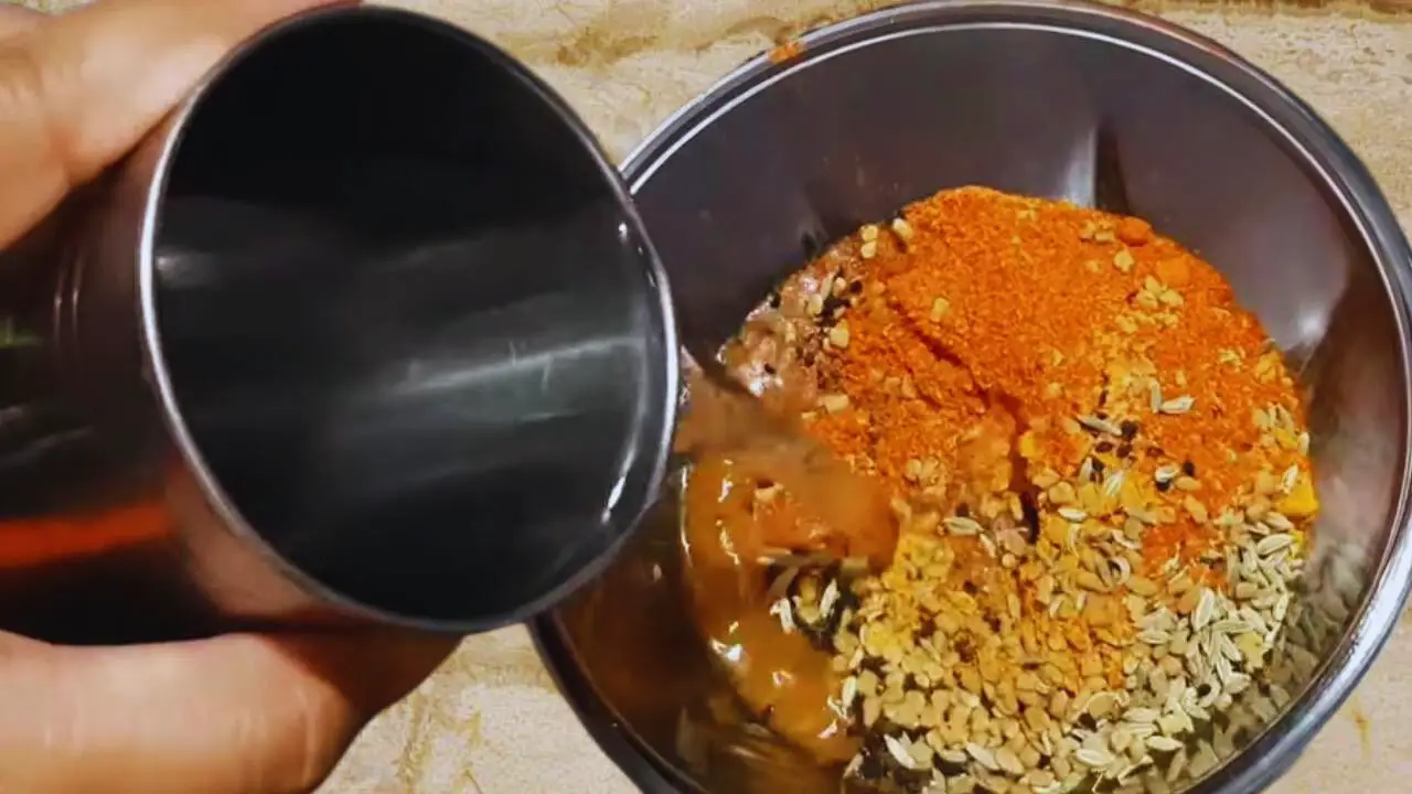Preparing the spice paste for making Karonda Chutney 