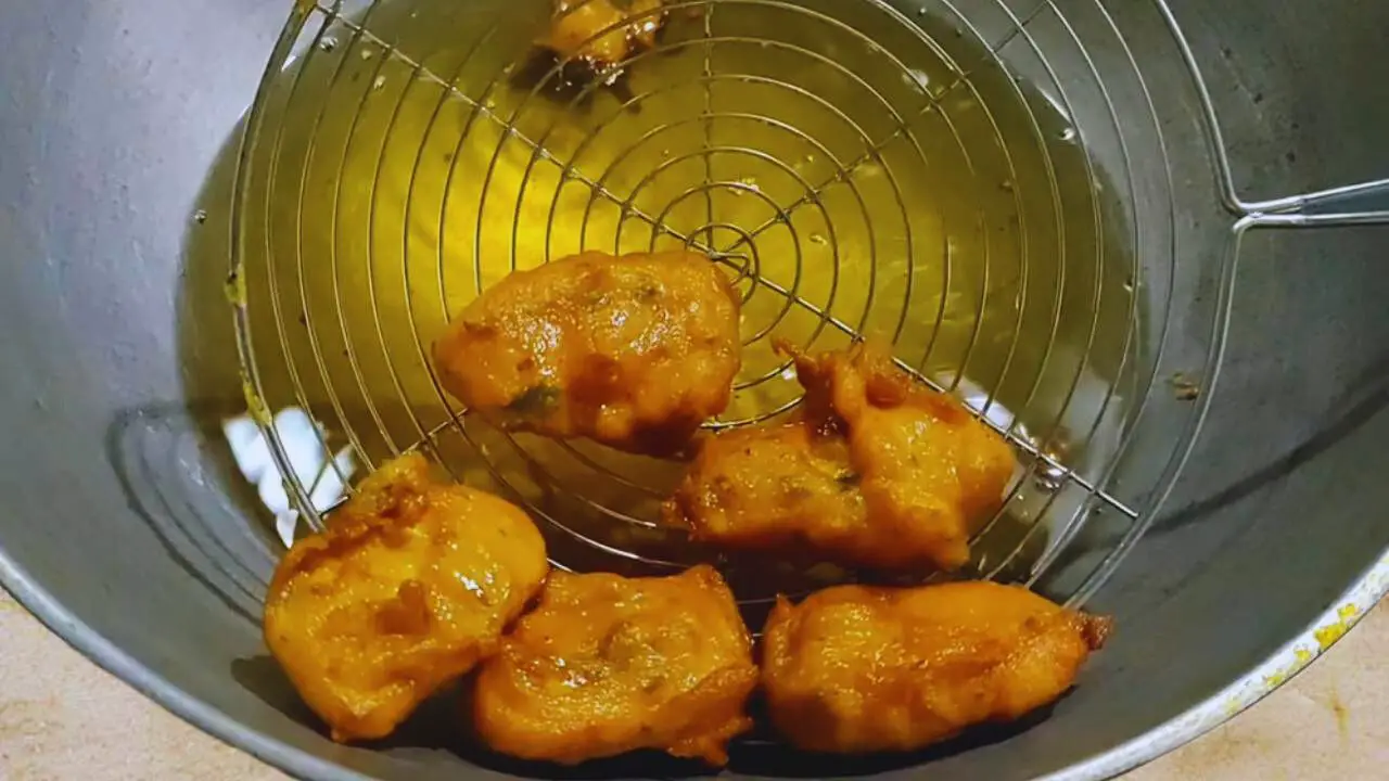 Removing Paneer Pakoras