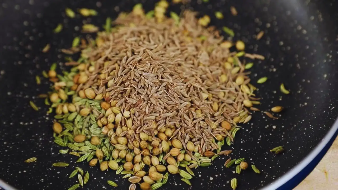 Roasting whole spices for making Bread Samosa 