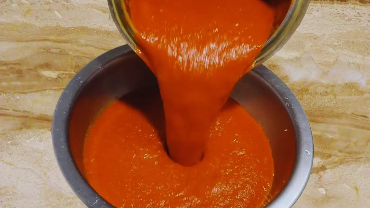 Transferring Momos Chutney ingredients to a bowl