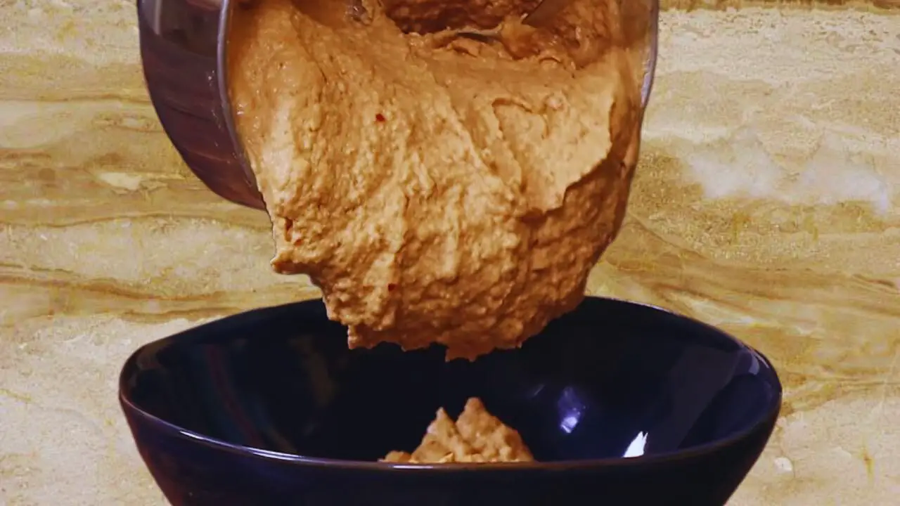 Transferring peanut chutney paste 
