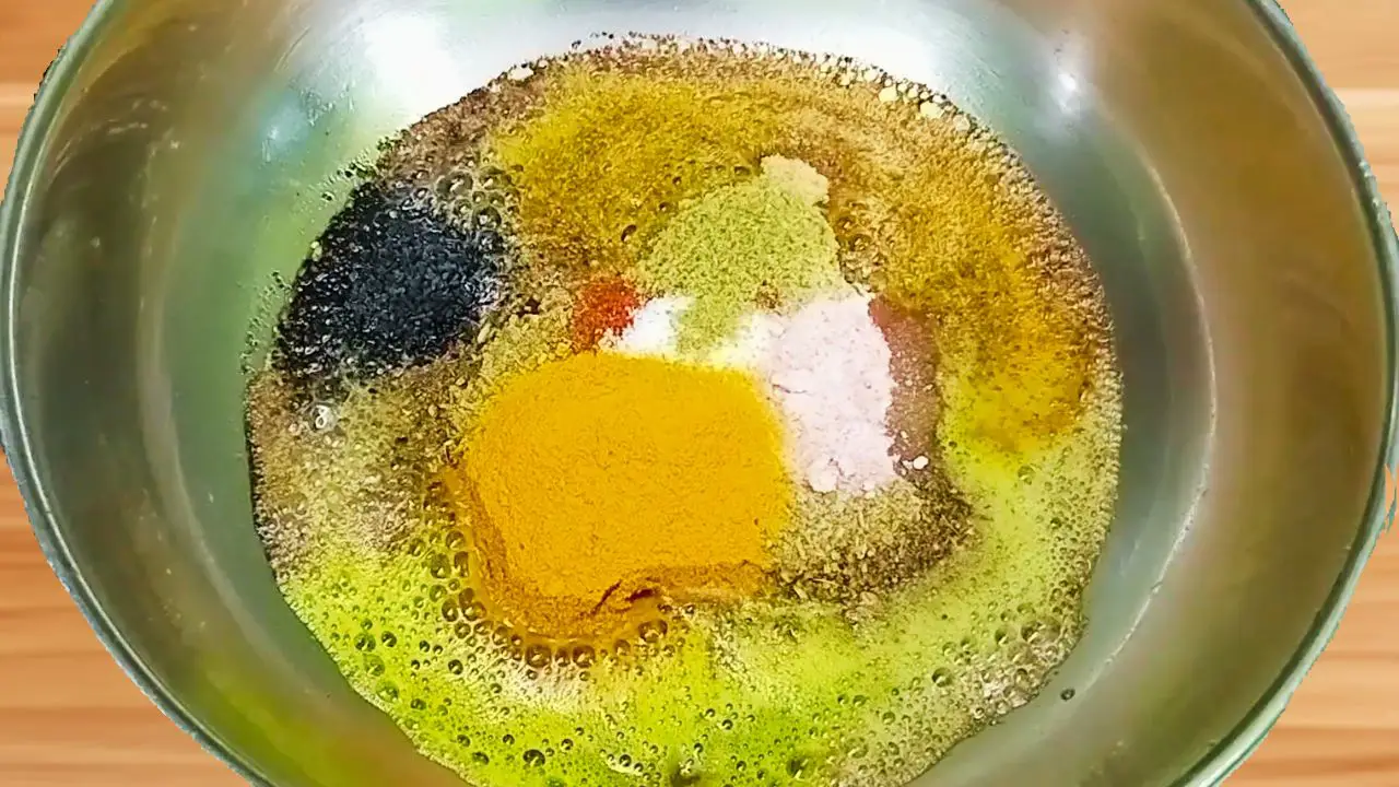 Adding all ingredients to mustard oil 