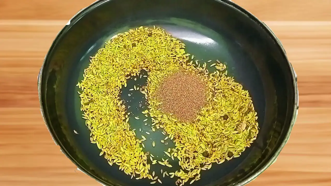 Adding brown mustard seeds to roast