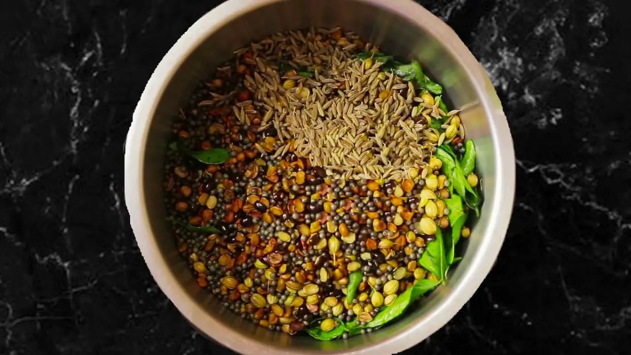 Adding cumin sees to the spices for Ginger Pickle