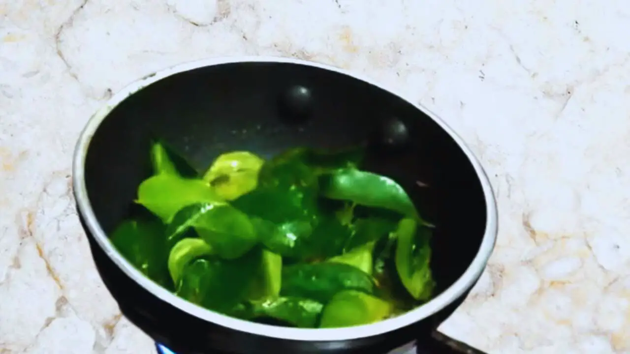Adding curry leaves 