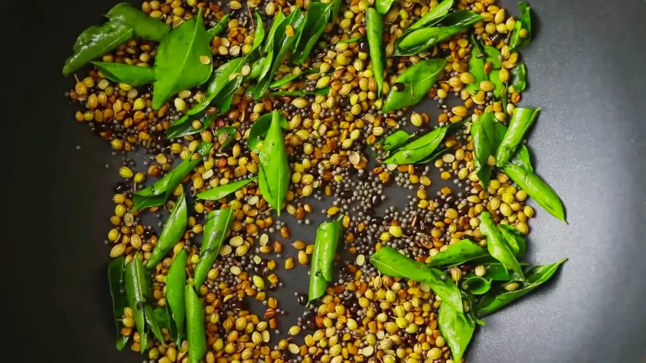 Adding curry leaves 