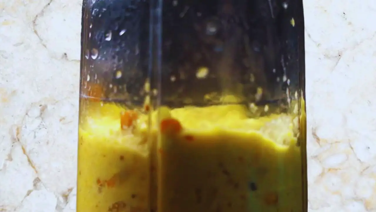 Grinding sweetcorn mixture 