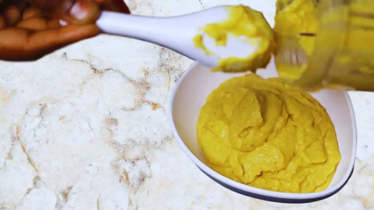 Transferring sweetcorn paste to a bowl 