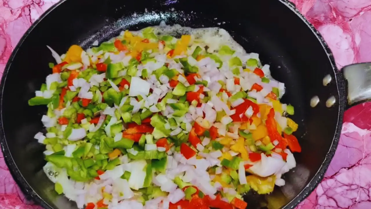 Adding chopped vegetables 