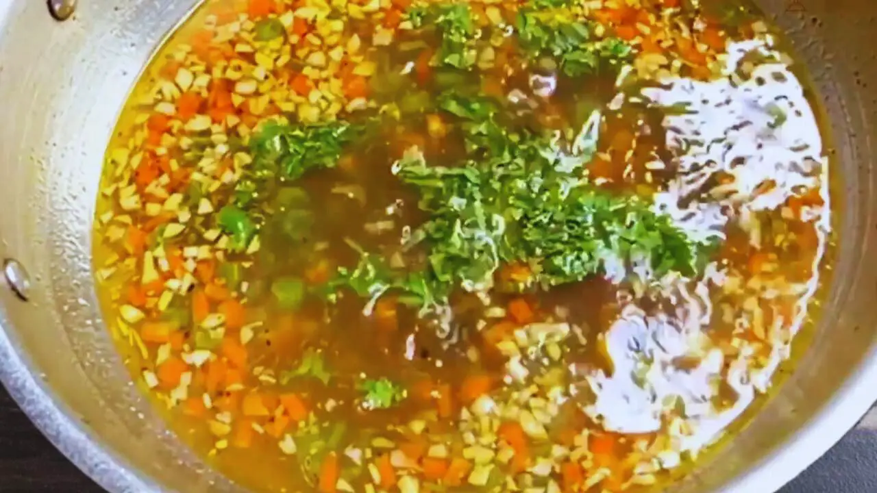 Adding coriander leaves 