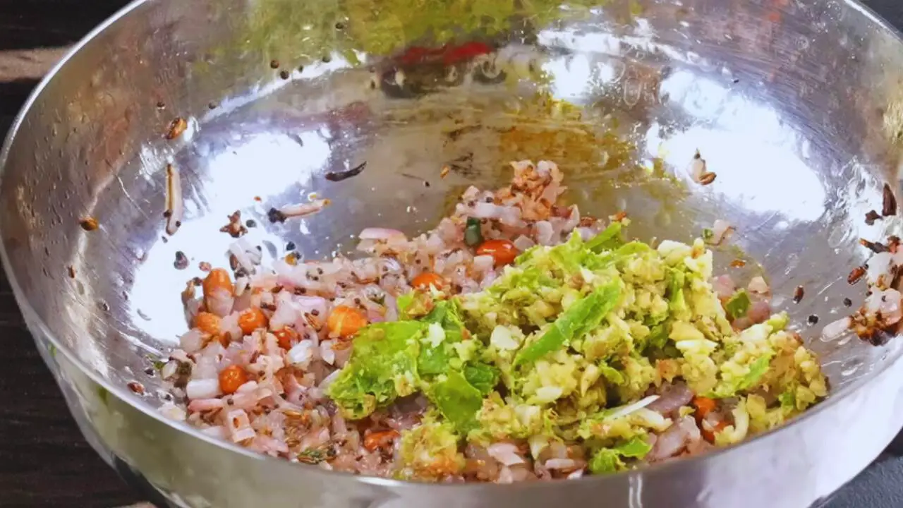 Adding crushed chili garlic 