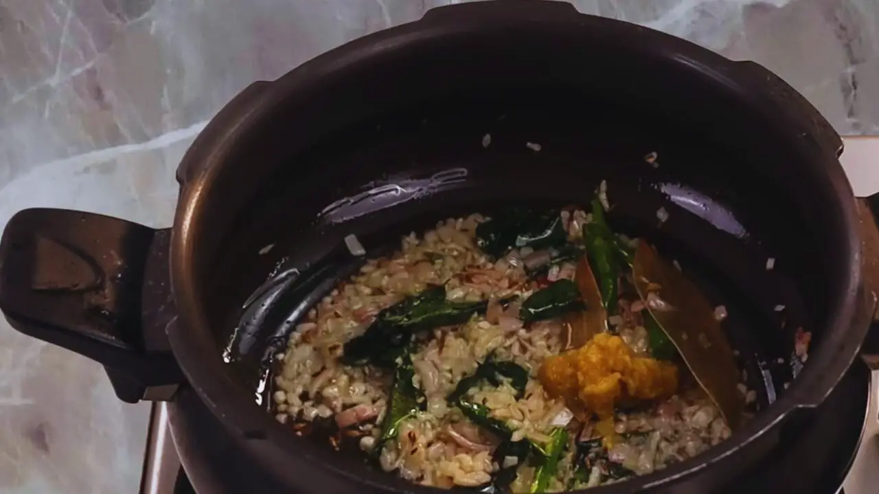 Adding ginger garlic paste 