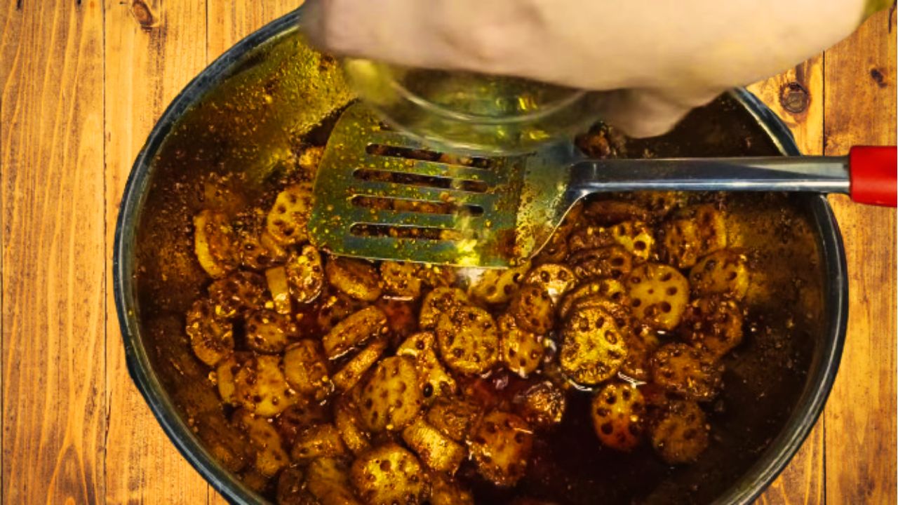 Lotus stem pickle recipe step 7 Adding lotus stems and vinegar