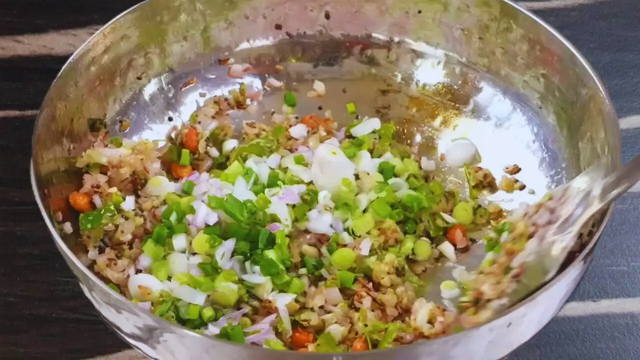 Adding lower part of spring onions 