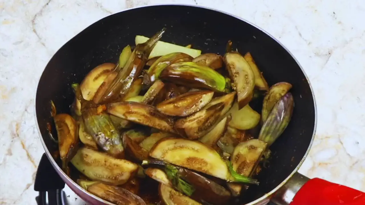 Aloo baingan curry recipe step 14 Adding potatoes and brinjal