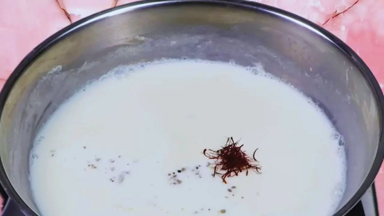 Rasmalai recipe step 9 Adding saffron