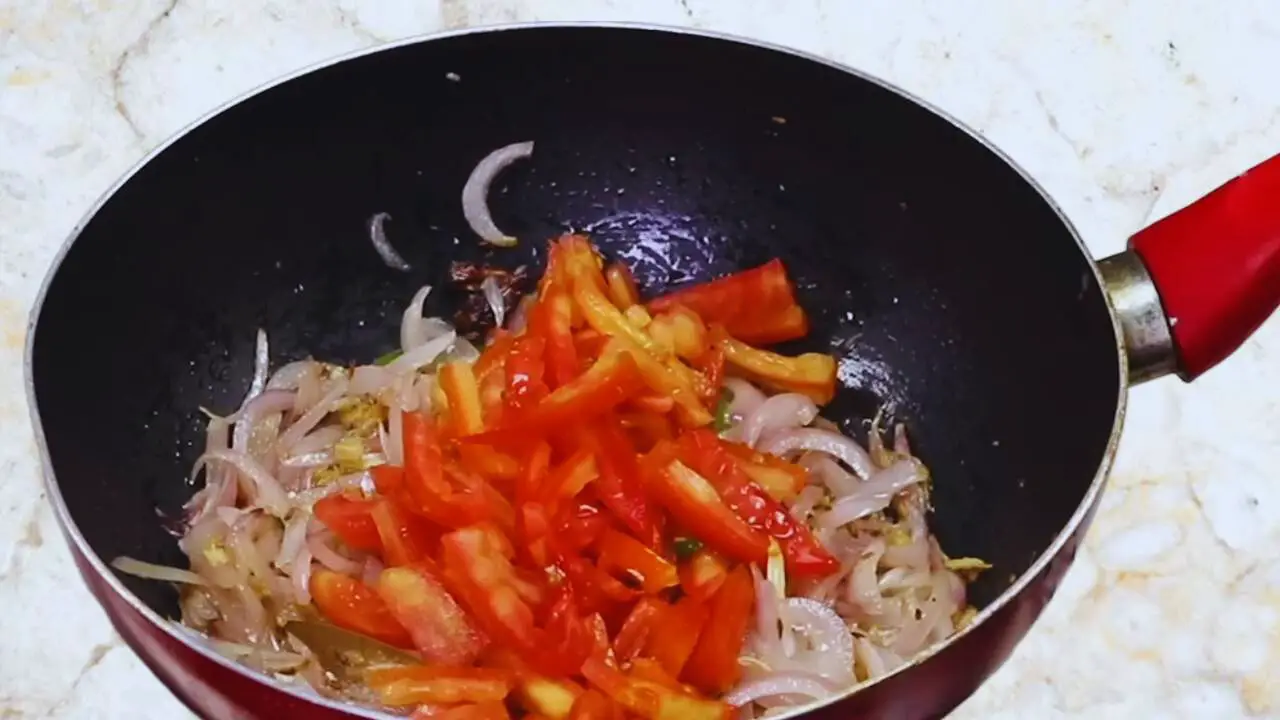 Aloo baingan curry recipe step 10 Adding tomatoes