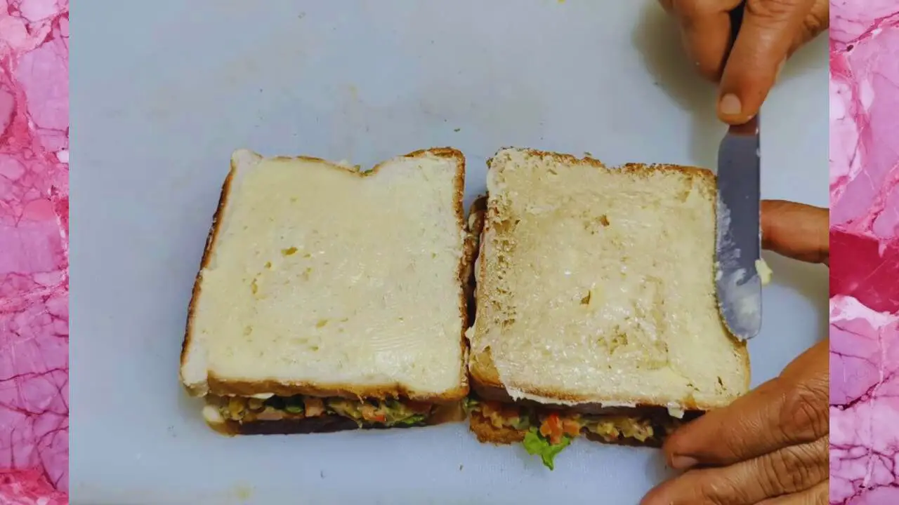 Applying butter on other bread slices 