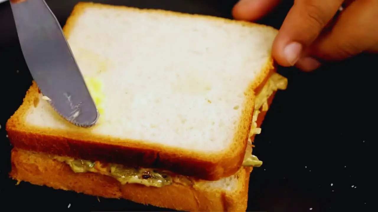 Applying butter 