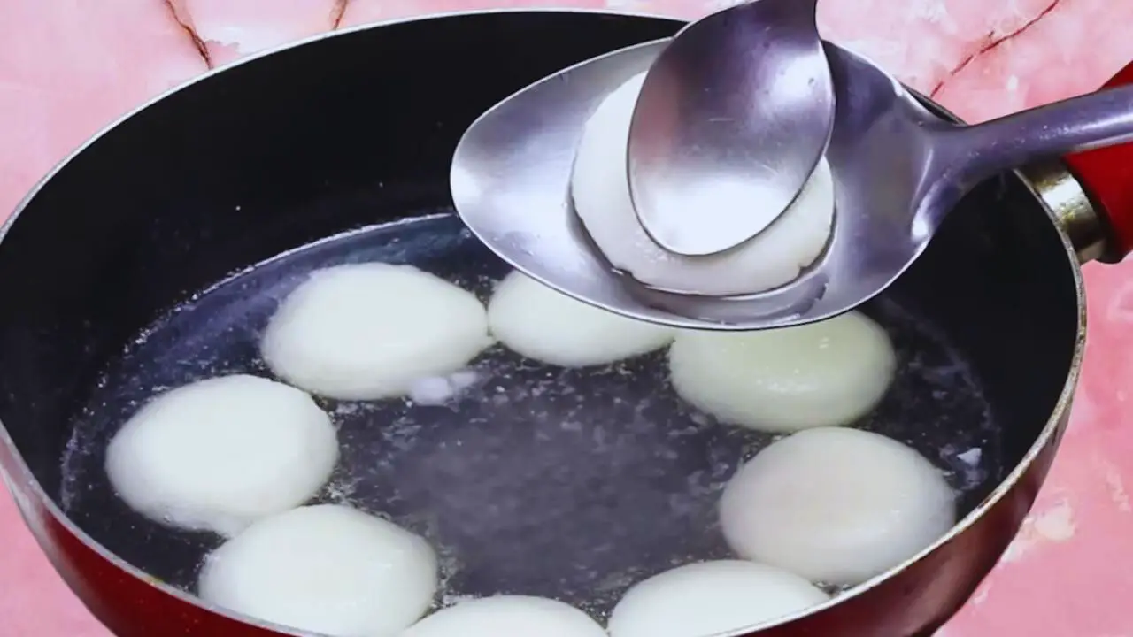 Rasmalai recipe step 20 Checking doneness of chena pedas