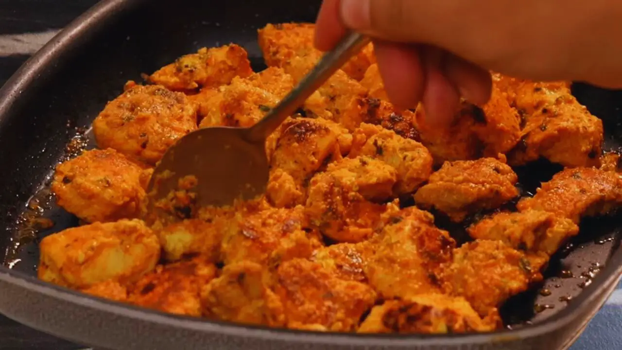 Checking doneness of chicken 