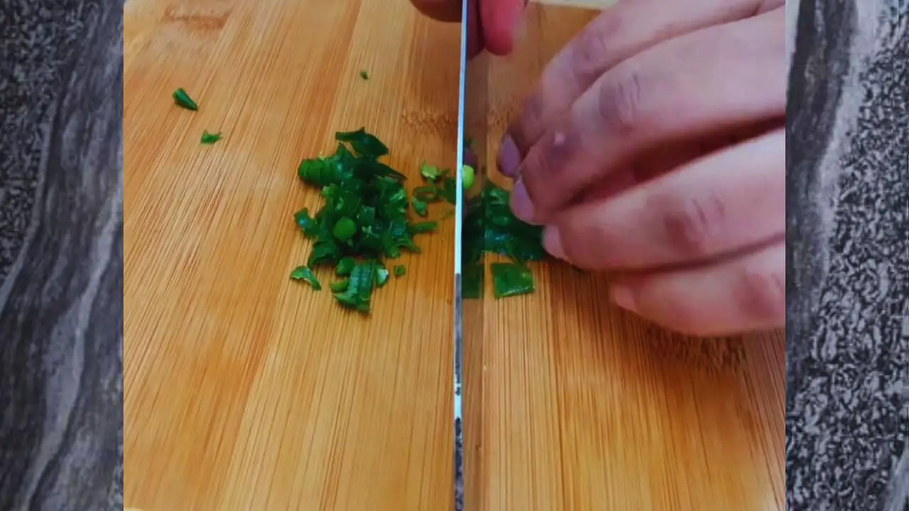 Chopping green chilies