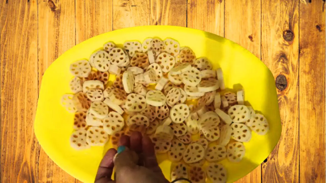 Lotus stem pickle recipe step 1 Cutting lotus stem