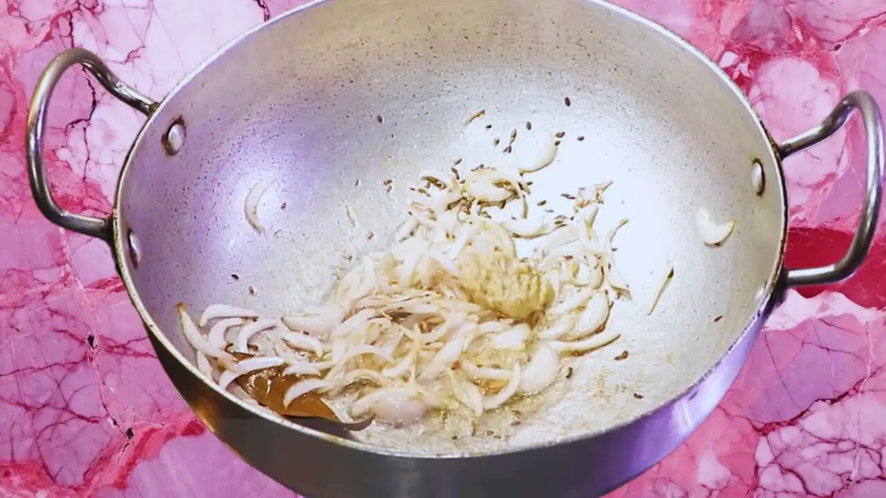 Frying onions and ginger garlic paste 