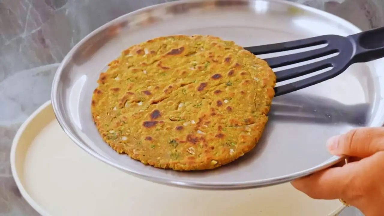 Removing Bajra Masala Paratha 