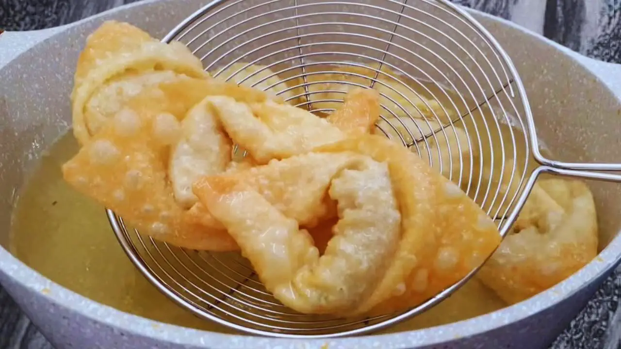 Removing fried chicken wontons 