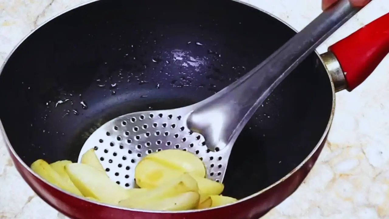 Aloo baingan curry recipe step 5 Removing fried potatoes