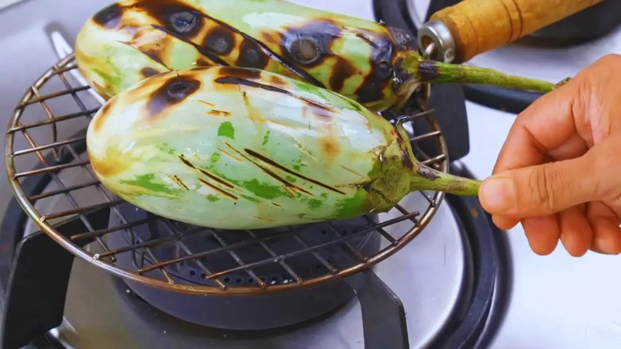 Roasting brinjals 
