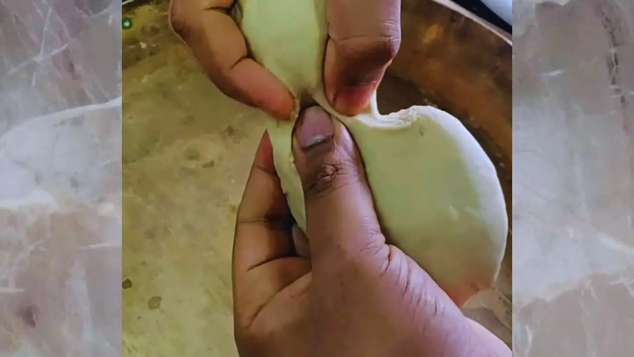 Taking a portion of the dough 