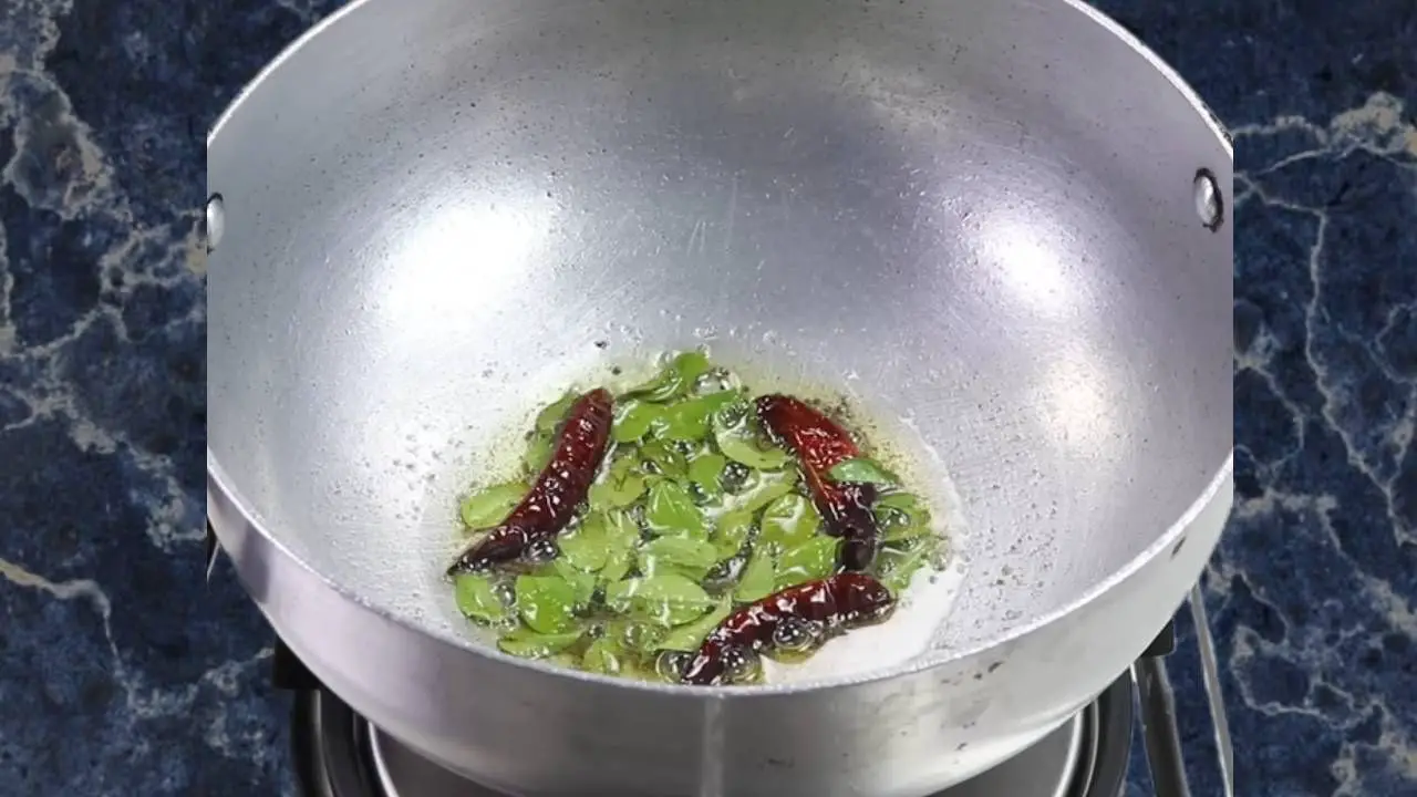Adding curry leaves 