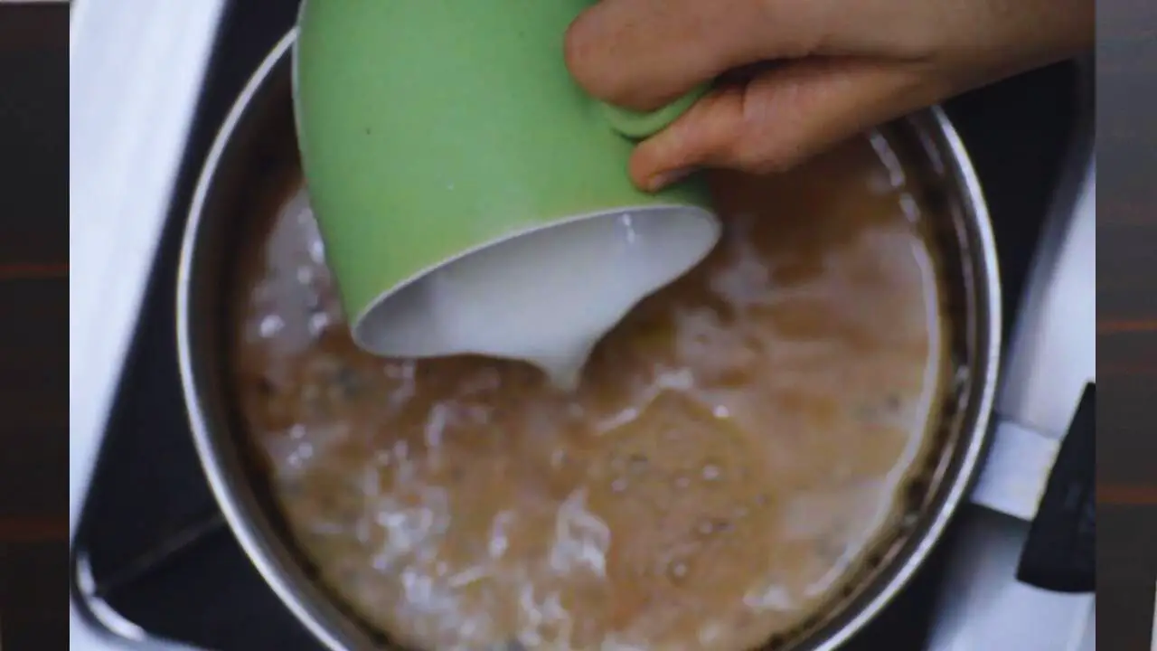 Tulsi tea recipe step 3 Adding milk