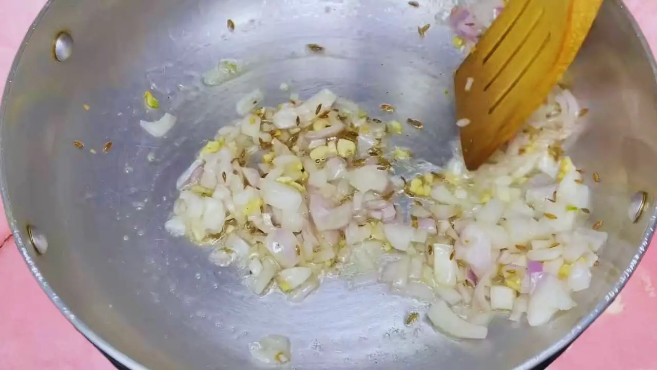 Aloo palak recipe step 3 Adding onions