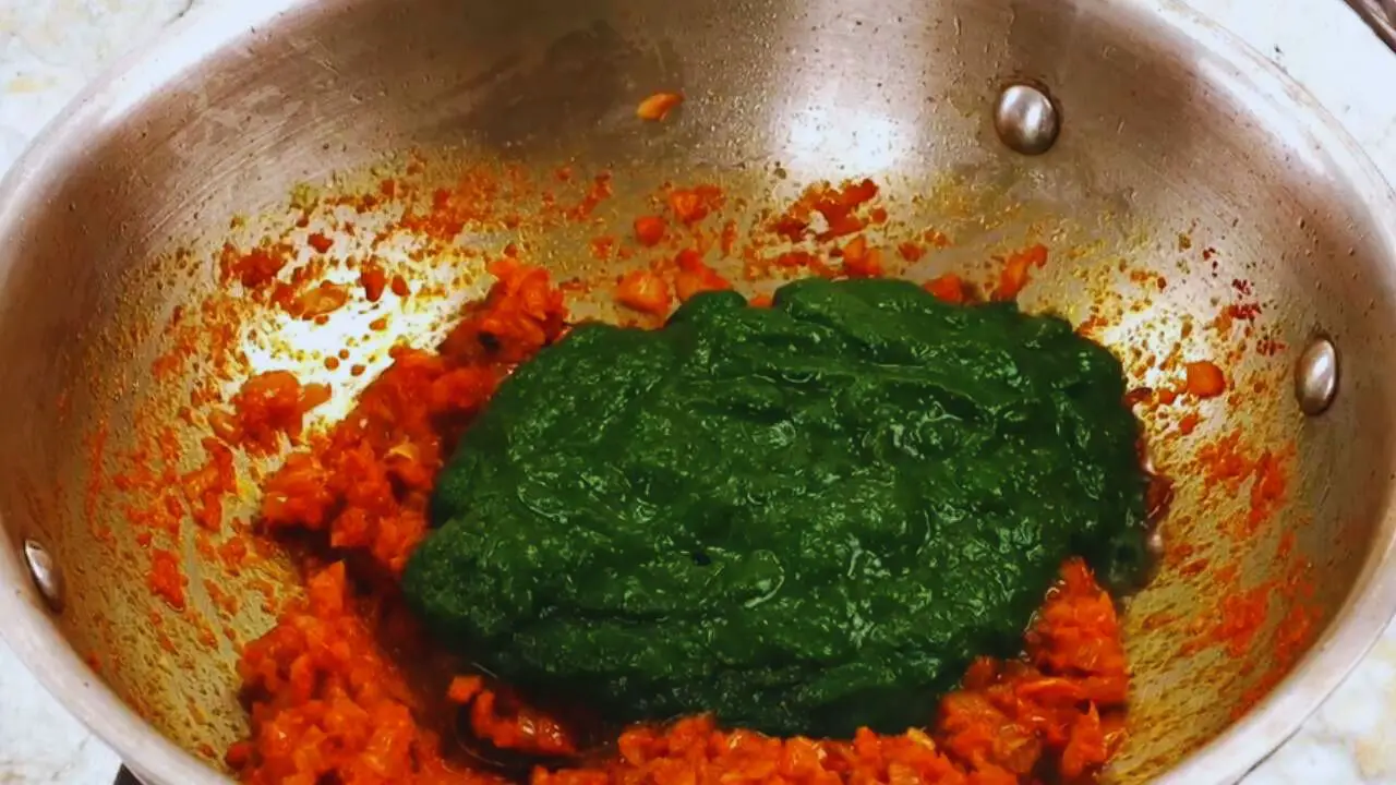 Palak egg curry recipe step 11 Adding palak paste