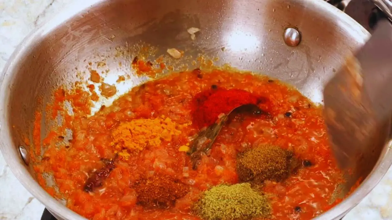 Palak egg curry recipe step 10 Adding powdered spices to make egg palak curry