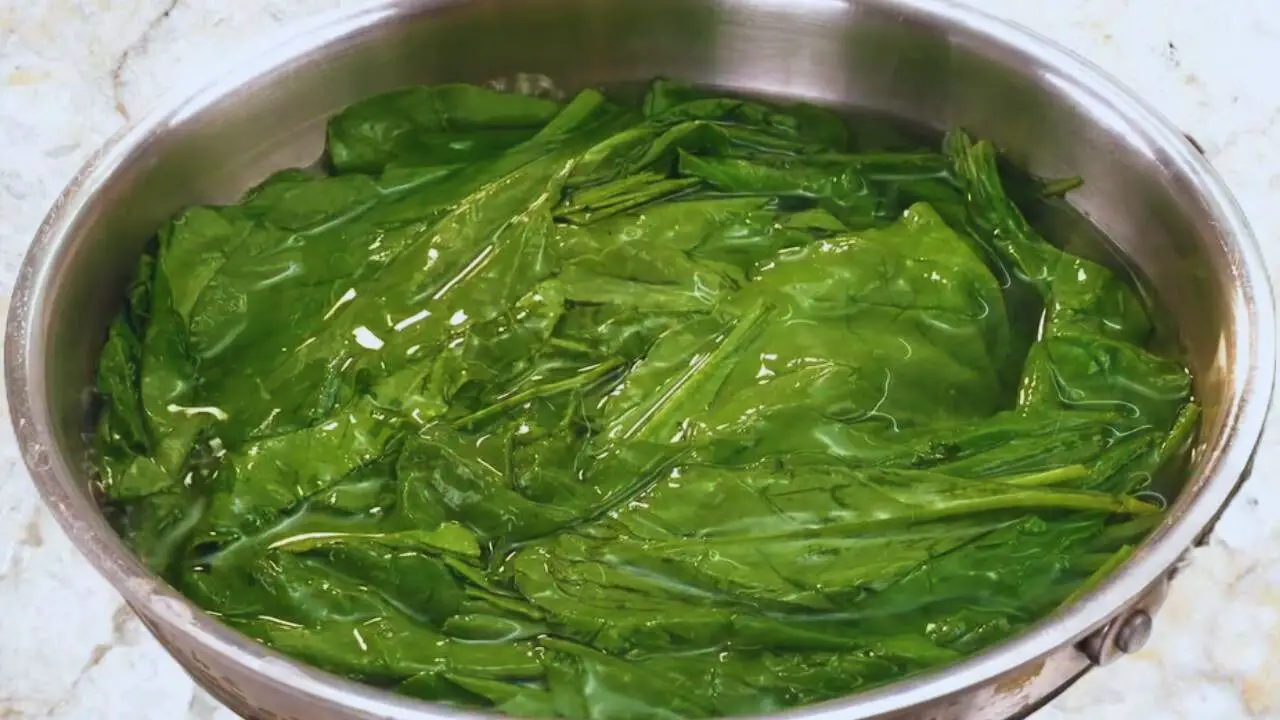 Palak egg curry recipe step 1 Boiling palak