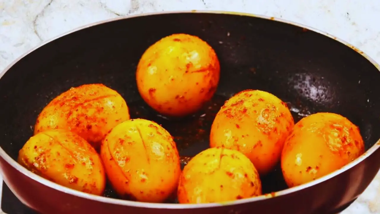 Palak egg curry recipe step 5 Frying eggs
