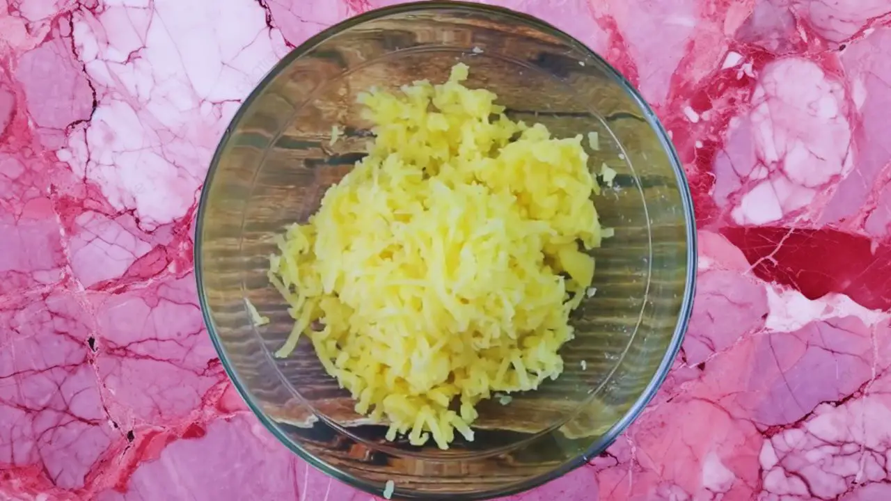 Vegetable nuggets recipe step 1 Grated potatoes