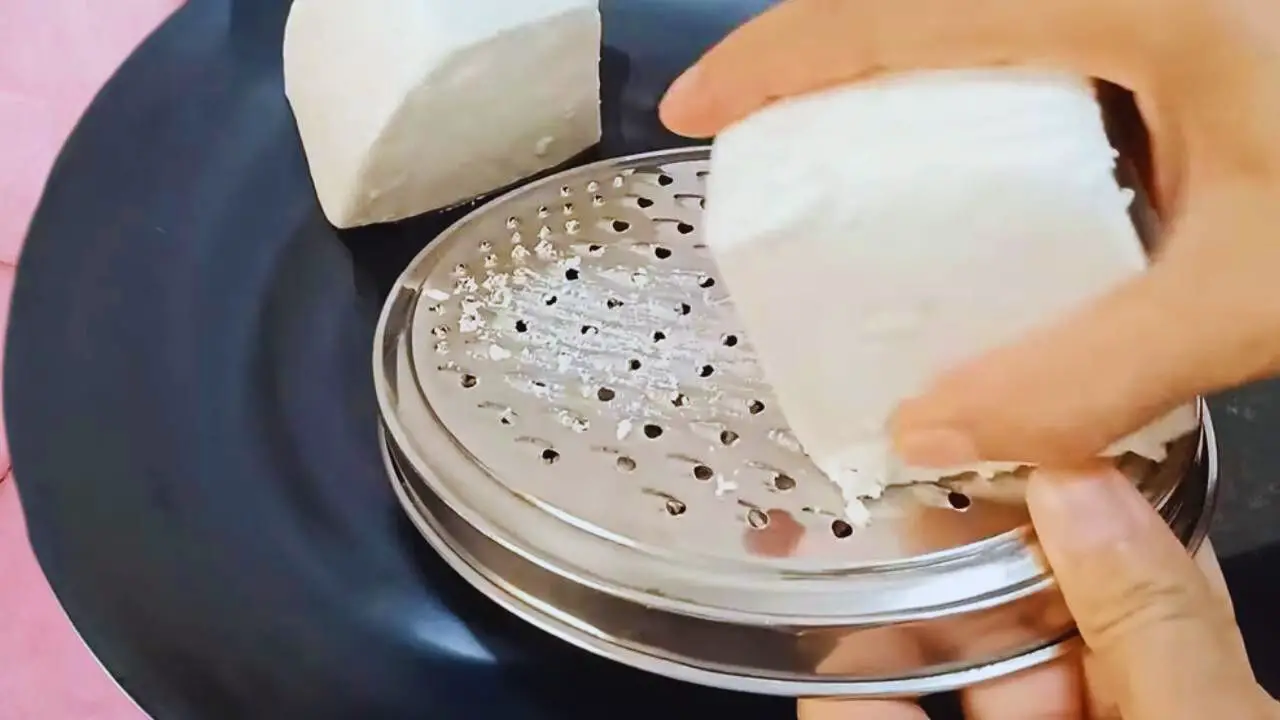Paneer paratha recipe step 4 Grating paneer