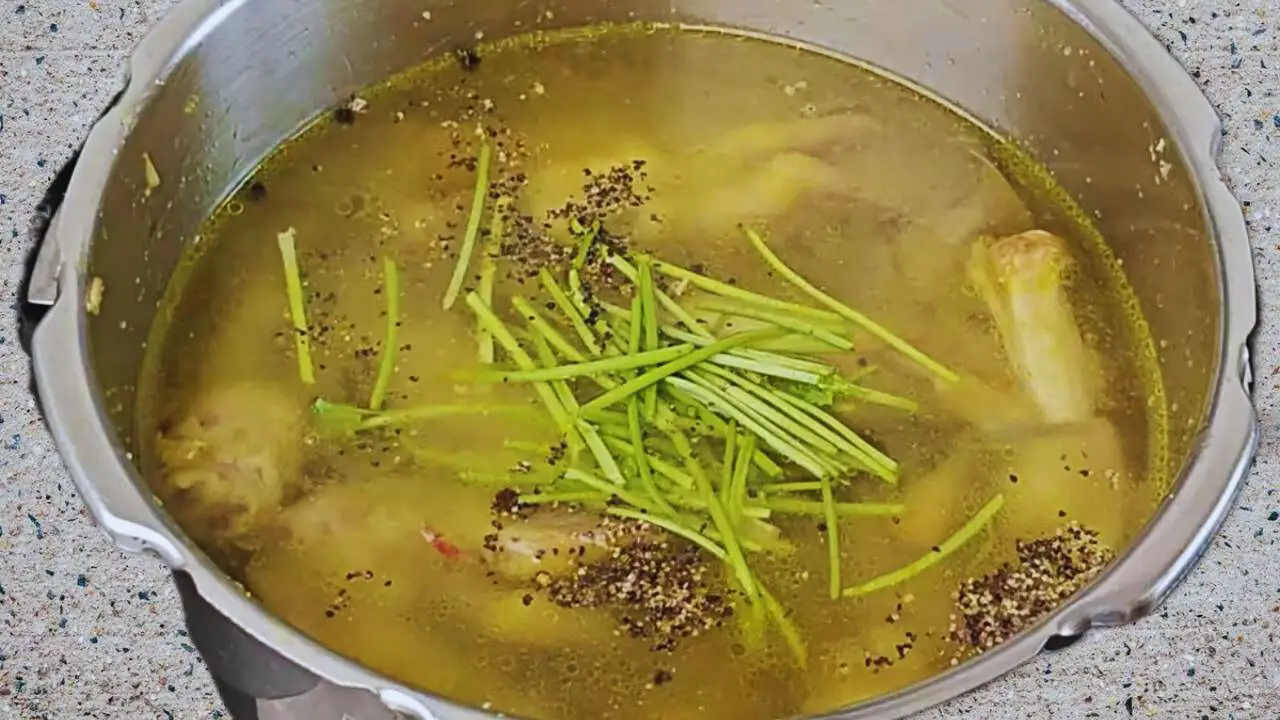 Adding black pepper and coriander stems 