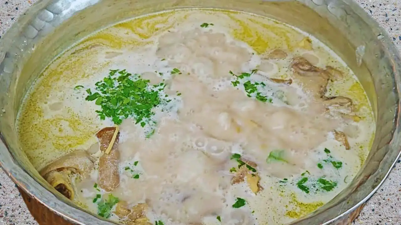 Adding ginger, chilies, and coriander 
