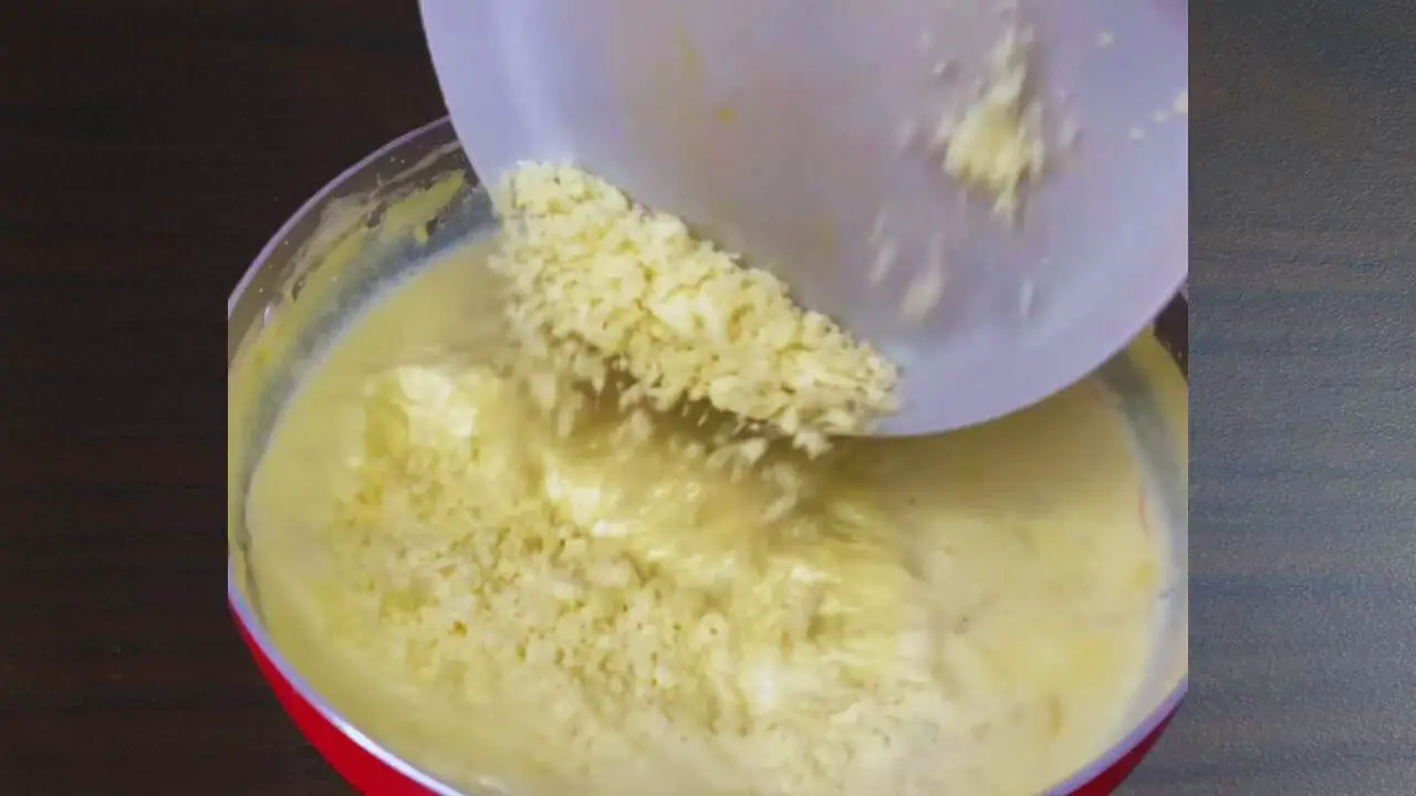 Adding grated khoya 