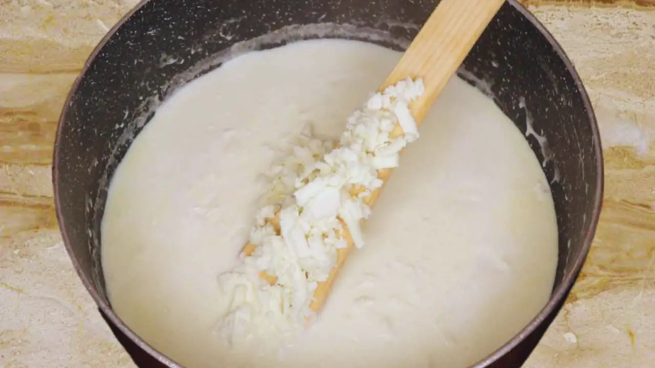 Adding grated paneer 