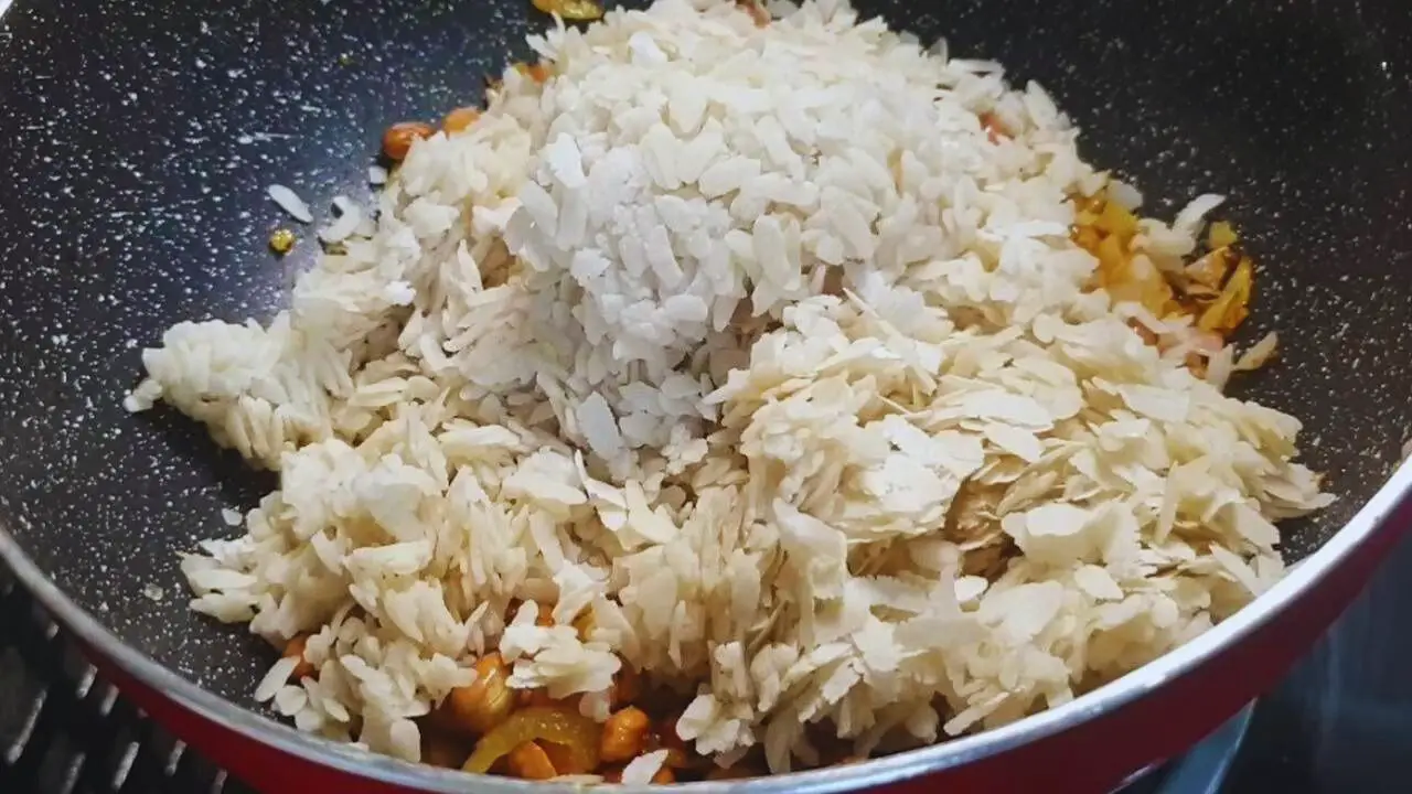 Poha recipe step 8 Adding soaked poha