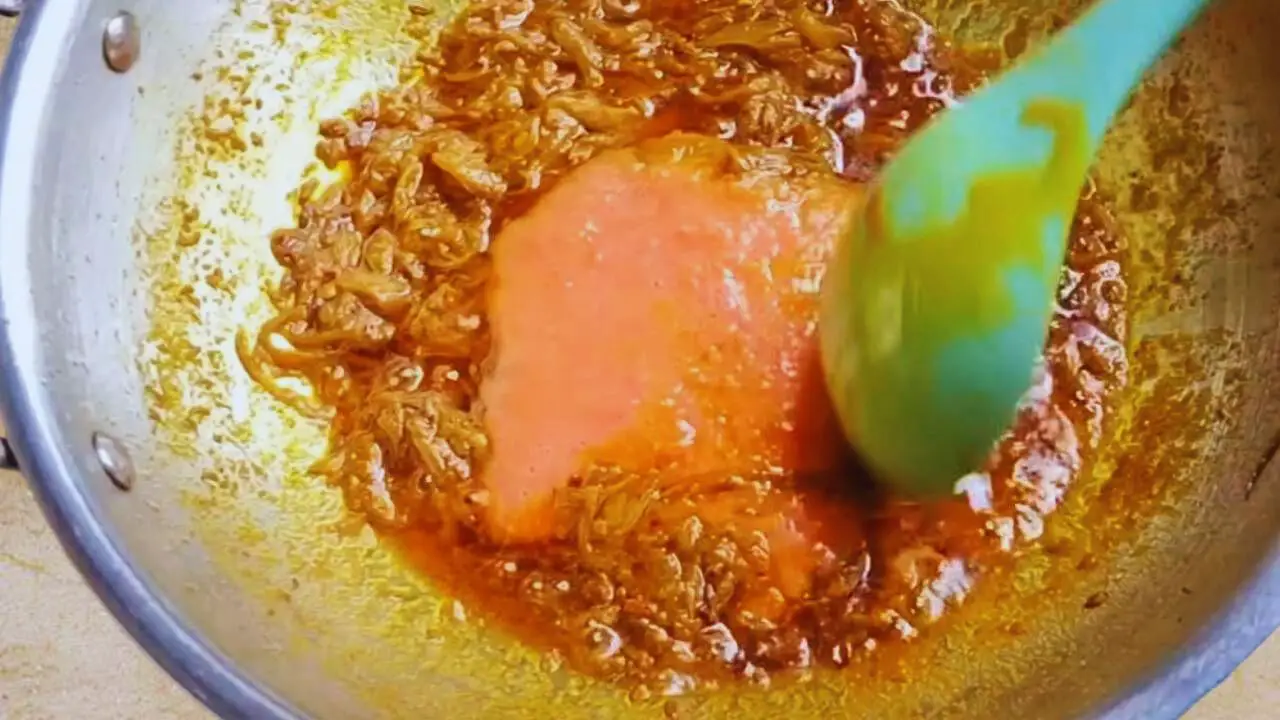 Bhindi masala recipe step 6 Adding tomato paste