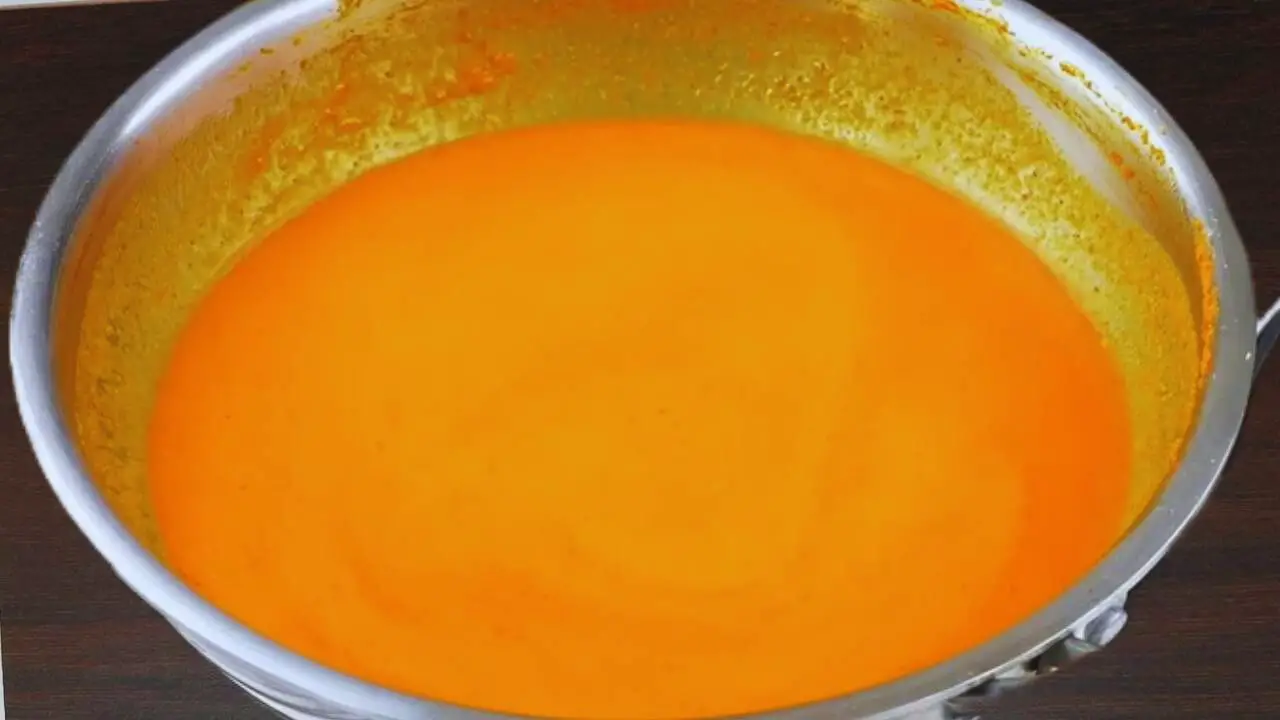 Adding water to the gravy 